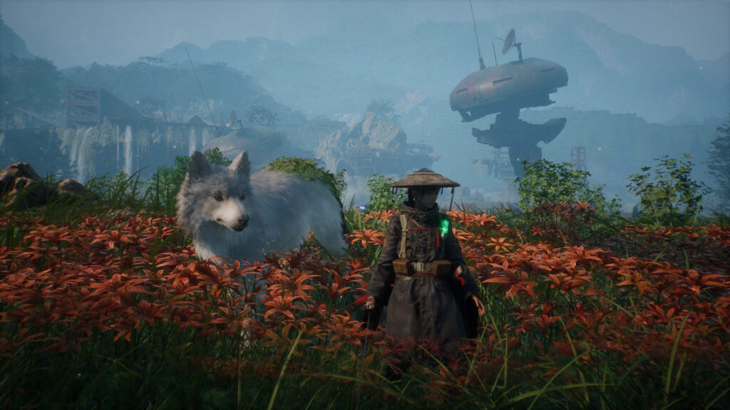 Emma and her white canine companion Koo stand together in a field of red flowers